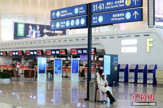 武汉天河机场旅客寥寥。<a target='_blank' href='http://www.chinanews.com/'>中新社</a>记者 张畅 摄 武汉天河机场旅客寥寥。<a target='_blank' href='http://www.chinanews.com/'>中新社</a>记者 张畅 摄